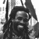 Who is a rastaman, and what is he eaten with?